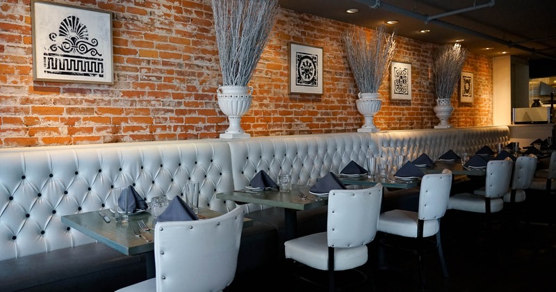 Interior, long seating bench with pictures on the wall