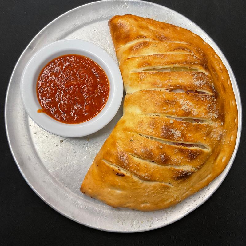 Extra Topping for Pizza or Calzone photo