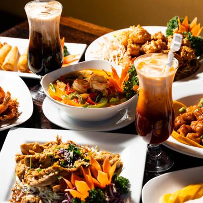 Different food dishes served on the table, side view