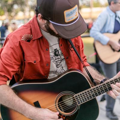 A guitarist performing.