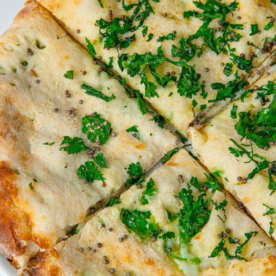 Cheese and jalapeno kulcha bread, close up top view.