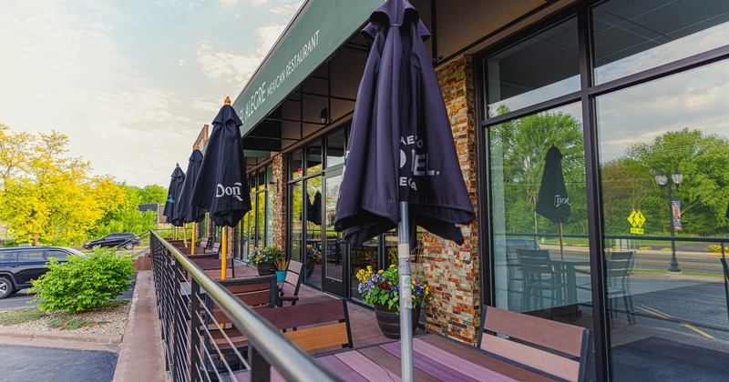 Exterior, patio with tables and chairs