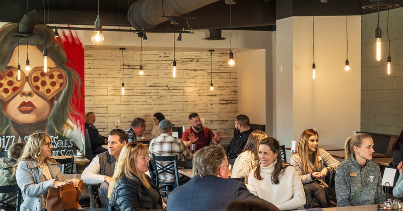Interior space, seating area with guests chatting