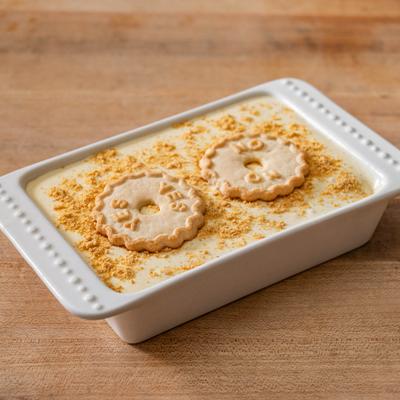 Creamy dessert topped with cookies.