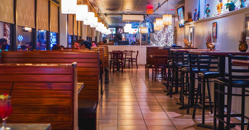 Interior, tables with barstools, and restaurant booths