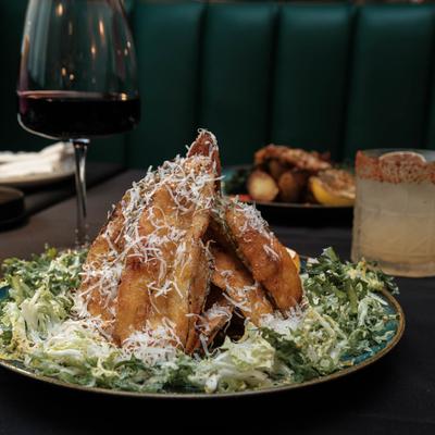 Zucchini Crisps with red wine and a cocktail.