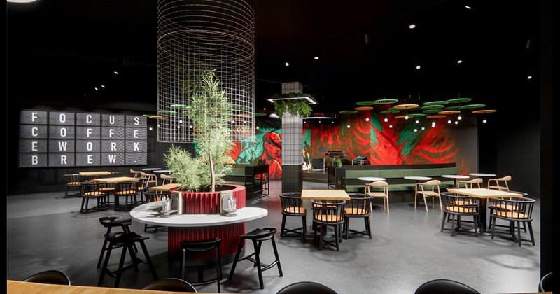 Restaurant interior featuring colorful murals and tables