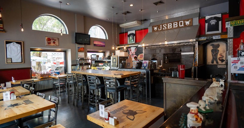 Interior dining area, tall tables and bar stools