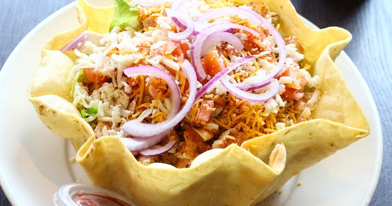 Pastry with meat, spices, vegetables and cheese