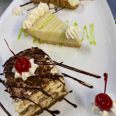 Dessert sampler with Tiramisu, Key Lime Pie and Cannoli..