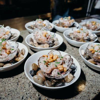 Bowls of elegantly plated shrimp.