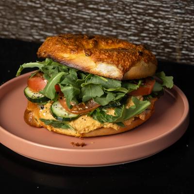 Served bagel sandwich in the plate.