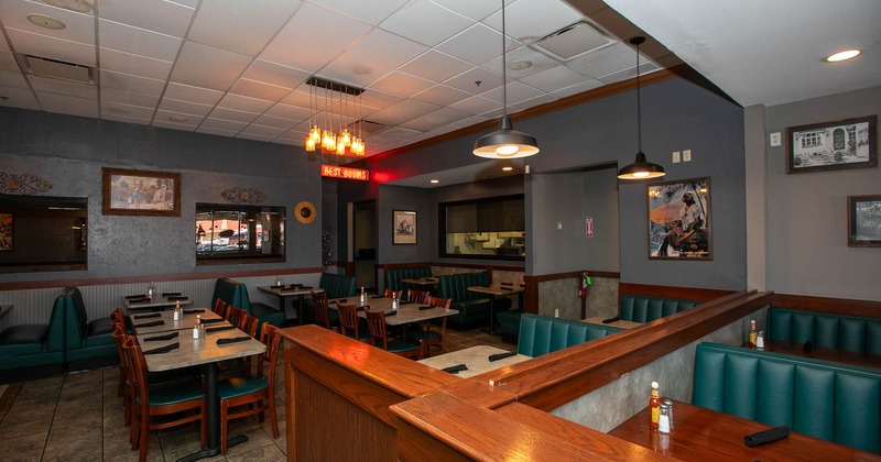 Interior seating space with chairs, tables and booths