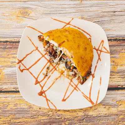 Grilled chicken corn dough sandwich.