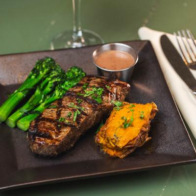 Grilled NY Strip Steak on a plate.