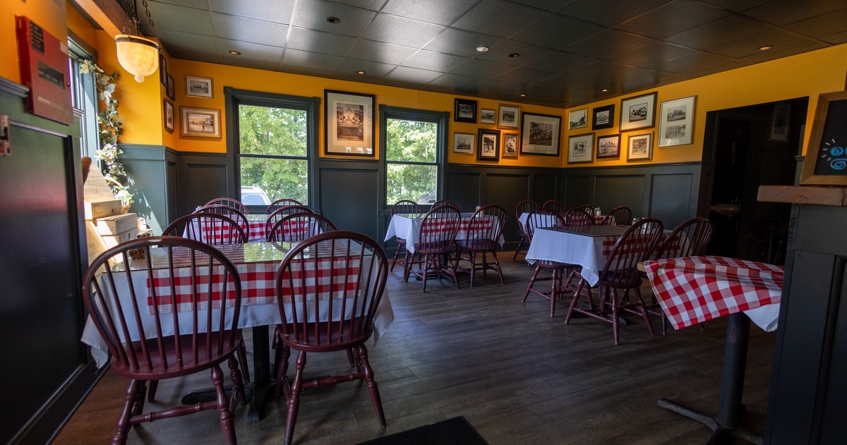 Interior, seating space with classic red and white checkered tablecloths