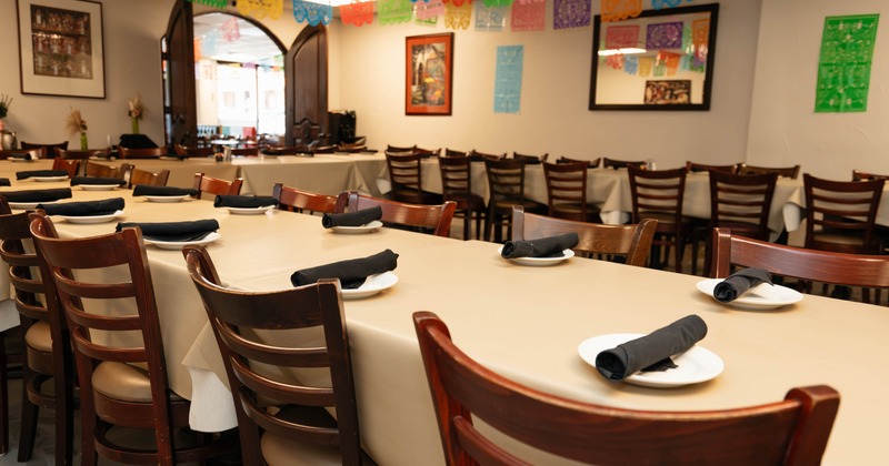 Interior, set tables ready for guests