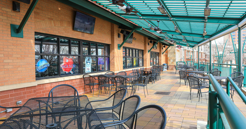 Restaurant exterior, tables outside ready for guests