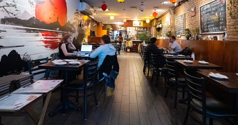 Interior, main dining area with guests