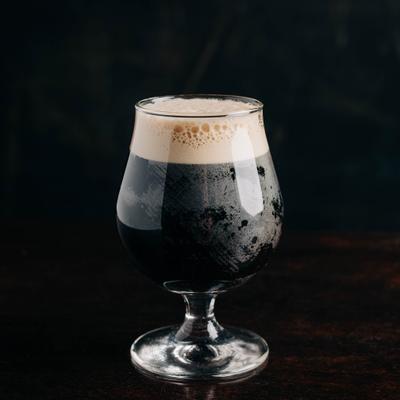 Nitro Brew served in a tulip glass.