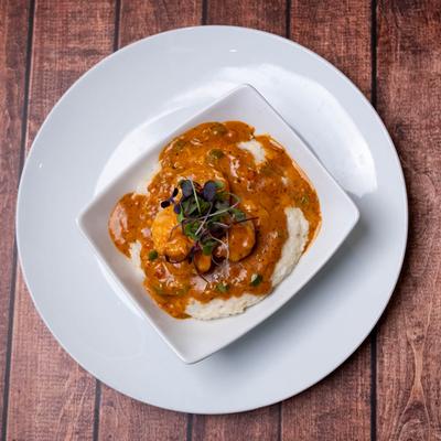 Shrimp grits, served.