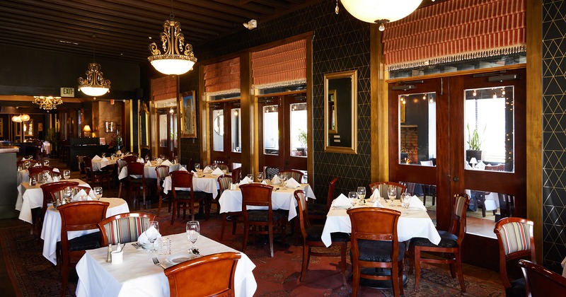 Cozy dining area with nicely set tables