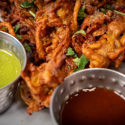 Vegetable Pakora with sauces for dipping.