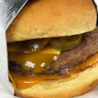 Daniel Burger with cheese, jalapeño, Dr Pepper bbq sauce.