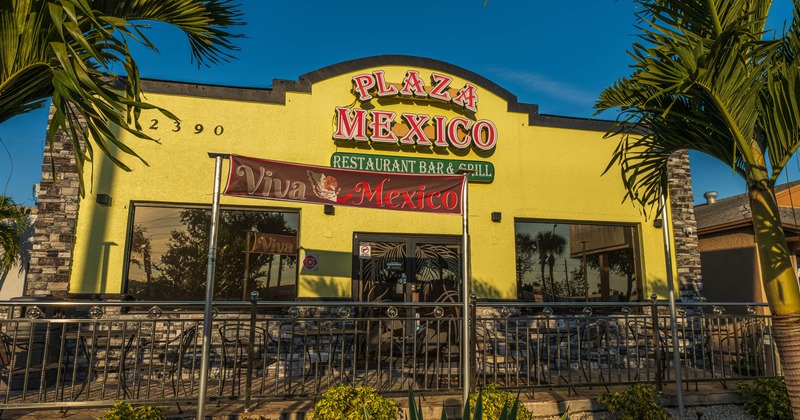Interior, patio with tables and chairs near the entrance