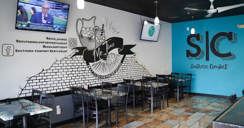 Seating tables lined up along the wall