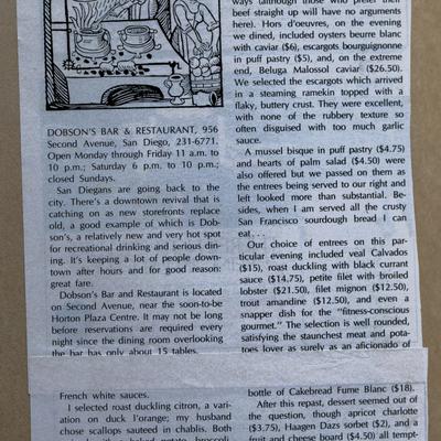 A newspaper clipping featuring a restaurant review for Dobson's Bar and Restaurant