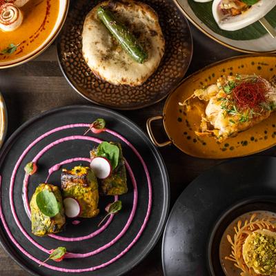 Group of dishes served on a table, top view