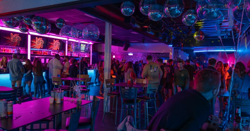 Nightclub atmosphere, people dancing