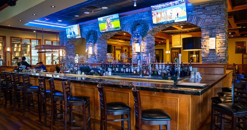 Indoor space with bar and barstools