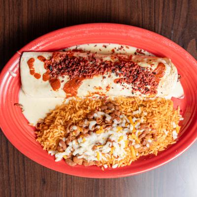 Burrito a la Diabla served with rice and topped with charro beans.