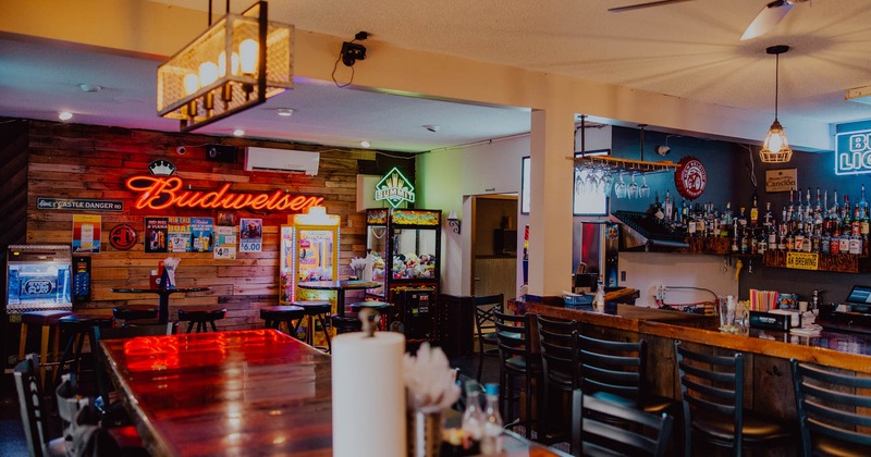 Interior, seating area with a bar in the back