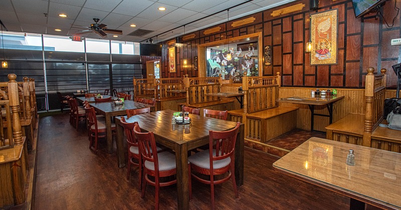 Interior, dining area, tables and dining booths ready for guests