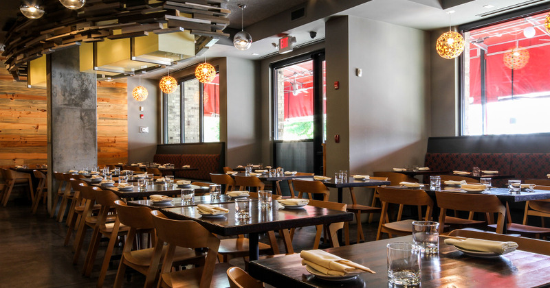 Interior, dining tables ready for guests