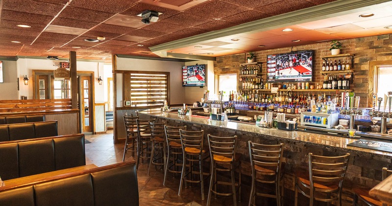 Bar area, bar , drink rack and tv above