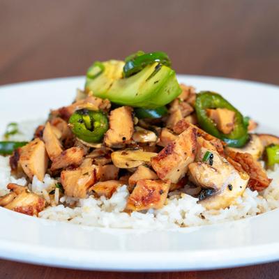 Chicken, mushrooms, green onion, jalapenos, & avocado over rice.