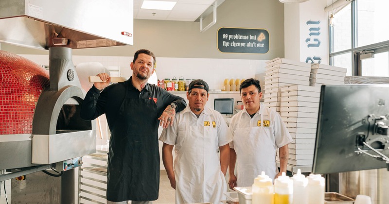 Kitchen staff posing together