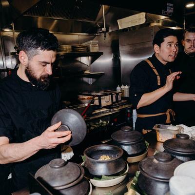 Chefs preparing a meal.