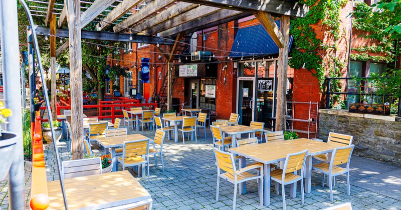 Outdoor seating area in front of the restaurant's entrance