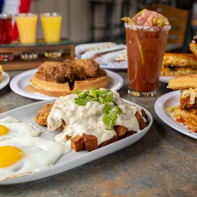 Assorted food and drinks on a table.