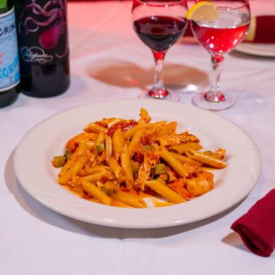 Chicken and shrimp pasta in vodka sauce.