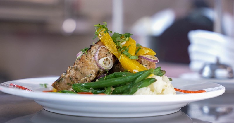 Grilled pork filet, with grilled vegetables, cilantro, oranges and mashed potatoes