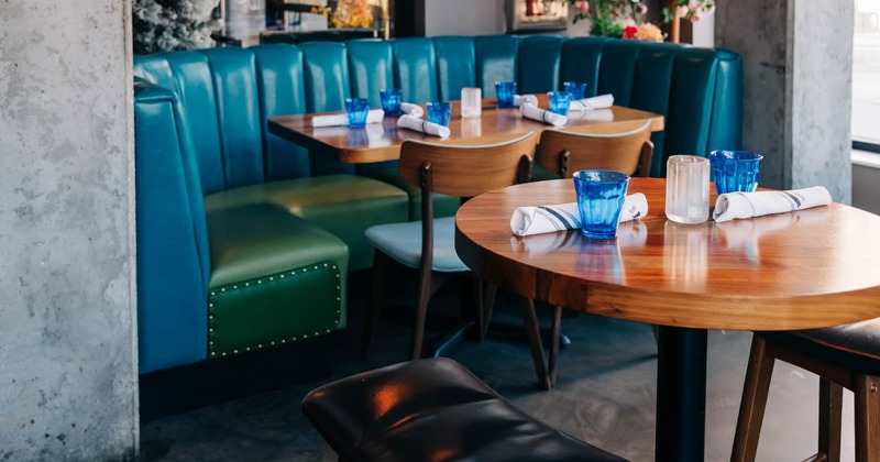 Interior, seating area, tables ready for guests