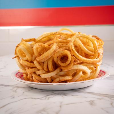 Serving of curly fries.