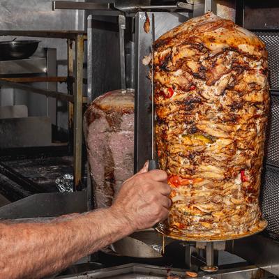 Cutting Shawarma.