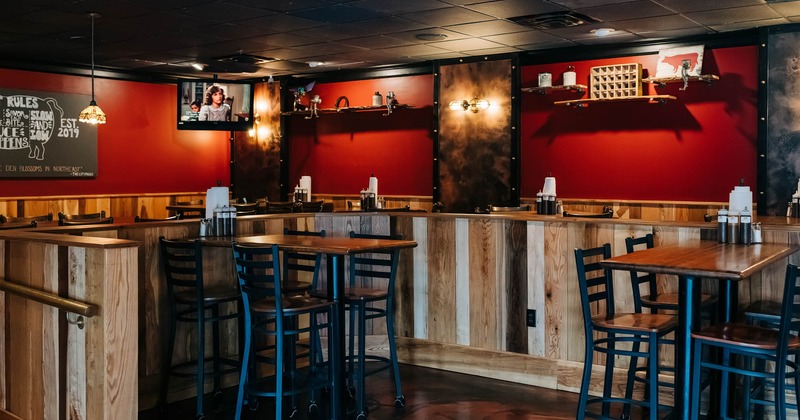 Interior, tables with tall chairs